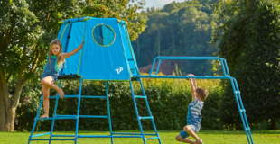 jungle gym with kids climbing on it