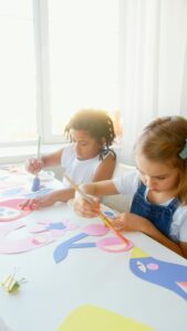 two children painting