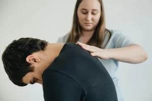 chiropractor treating a patient