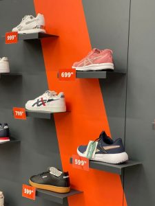 Sneaker factory sneakers on the wall at Galleria Mall