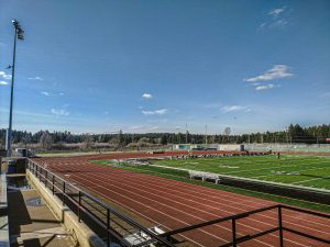 An athletics stadium. Reflecting on achievements puts you ahead of others.