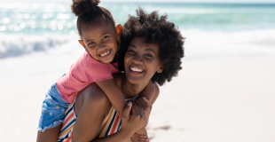 Mom and child in the sun. Be safe this season and protect your child from sunburn