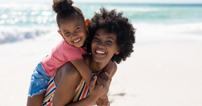 Mom and child in the sun. Be safe this season and protect your child from sunburn