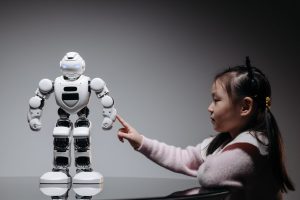 child and a robot
